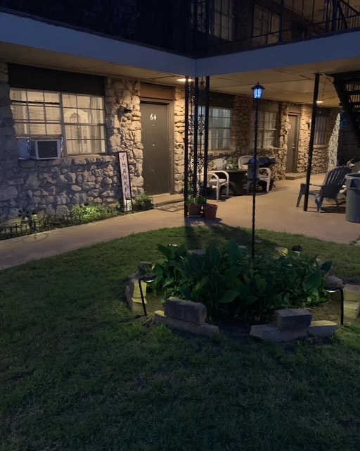 Tree-lined courtyard at Charlemagne Apartments